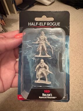 Nolzur's Marvelous Miniatures Half-Elf Rogue - Gray Mini Figures